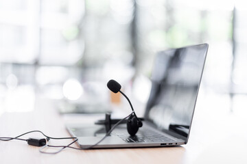 Communication support, call center and customer service help desk. headset on laptop computer...