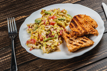 Healthy eating concept, fresh salad with vegetables and grilled turkey