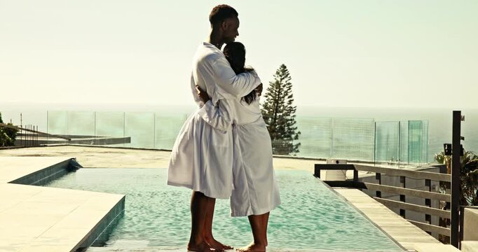 Honeymoon, pool and couple hug at hotel for anniversary, commitment and vacation together. Hospitality, love and man and woman embrace for romance, affection and bonding on holiday, travel or weekend