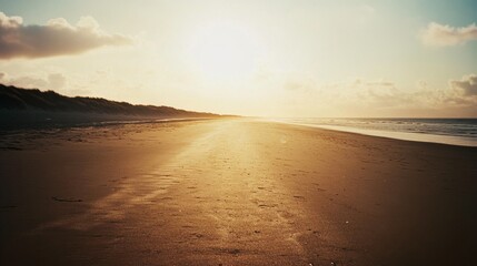 A film photograph of an empty beach at sunrise, the horizon glowing with muted pastel hues, and the soft texture of film adding a dreamy, timeless quality." -