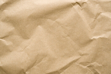 Wrinkled recycled paper background covering the entire frame