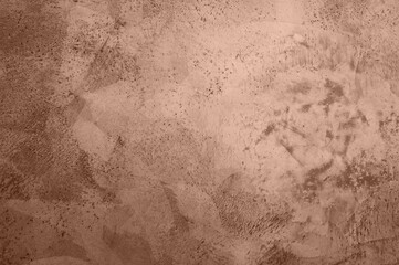 abstract concrete background in color 2025 Mocha Mousse. High quality photo