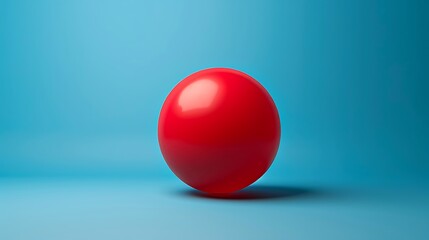 A large red ellipsoid floating against a solid blue backdrop