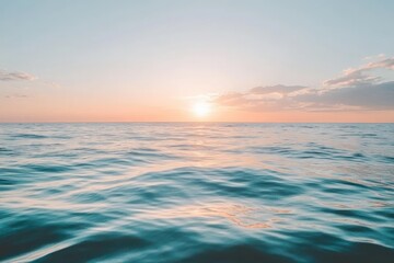 Obraz premium Serene Ocean Sunset Over Calm Waters