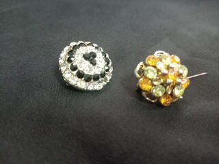 muslim shawl brooch with gems on black background, closeup. photo taken in malaysia
