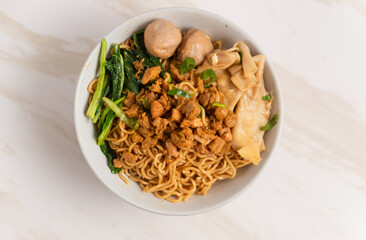 Mie Yamin is a food from Indonesia that tastes delicious. Mie Yamin which is similar to Chicken Noodles with the addition of meatballs, vegetables, boiled dumplings