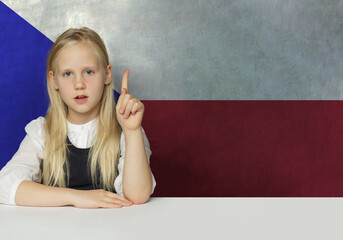 Clever child girl on Czech flag background. Education and study language in Czech Republic concept © artmim