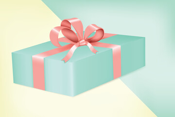 Pastel green gift box with satin ribbon on a yellow and pastel green background