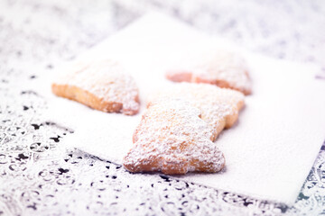 Christmas cookies on bright background. Soft focus. Close up.