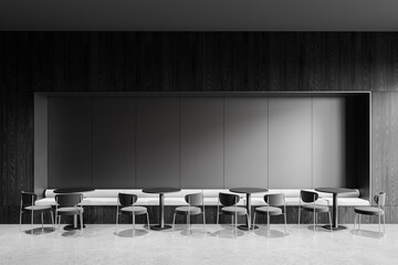 Minimalist seating area with modern chairs and tables against a dark wood-paneled wall. 3D Rendering