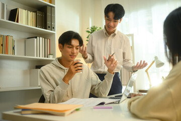 Tutor explaining topic and talking to students during a private lesson. Education and knowledge concept