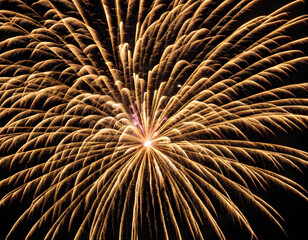 Golden firework fireworks on dark black night sky texture