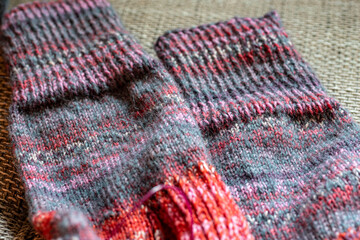 colorful knitted work in progress, handicraft concept, knit texture, wool handicrafts, hobby