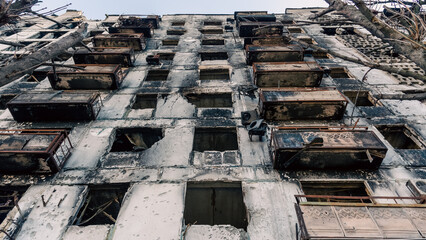 destroyed and burned houses in the city in Ukraine