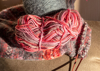 colorful knitted work in progress, handicraft concept, knit texture, wool handicrafts, hobby