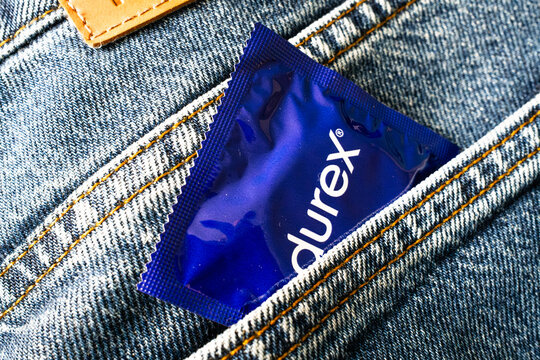 London, UK, 14.12.2024: Durex condom package in jeans pocket, contraception and safe sex concept