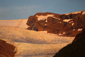 Naklejka premium Svartisen glacier in the evening sky in Holandsfjord, Norway