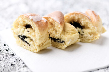 Close up of strudel with poppy seeds. Soft focus. Bright background. 