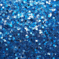 Shiny blue glitter in an abstract, defocused background &ndash; perfect for Christmas and New Year textures.