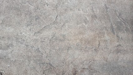  Close up of a weathered concrete surface with visible pores and grains. Ideal for industrial or rustic designs