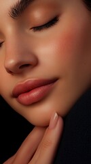 Fototapeta premium Close-Up Portrait of a Woman with Smooth Skin and Natural Makeup, Eyes Closed, Highlighting Beauty and Skincare, Perfect for Cosmetic and Wellness Themes