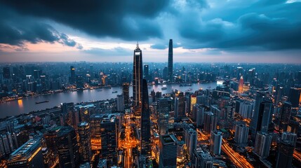 Obraz premium Stunning Aerial View of Modern City Skyline at Dusk with Dramatic Clouds and Illuminated Skyscrapers