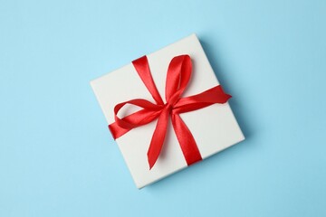 Gift box on color background