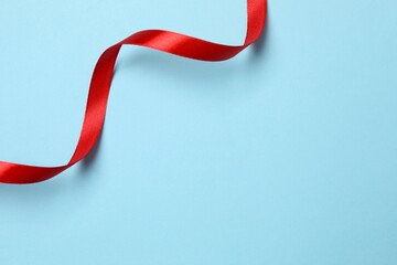 Silk ribbon on color background