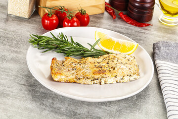 Baked salmon fish served rosemary