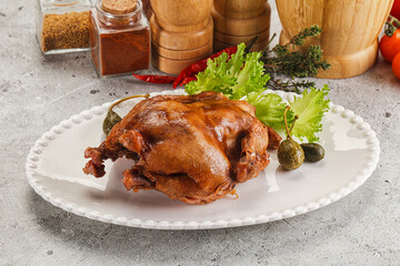 Baked small chicken with spices