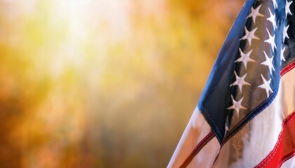 Close-Up of Waving American Flag with Stars and Stripes, Sunlit Against a Golden Autumn Background. Perfect for USA National Holidays, Veterans Day, Memorial Day, or Patriotic Celebrations