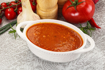 Hot tomato soup with diced chicken