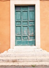 Fototapeta premium Old wooden door in the town of Rovinj, Croatia