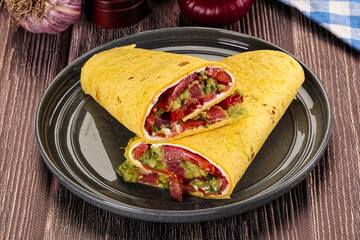 Burrito with tuna and vegetables wrap