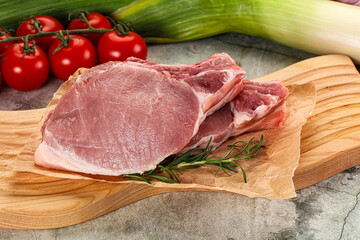 Raw pork steak loin with bone