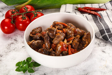 Baked chicken hearts with vegetables