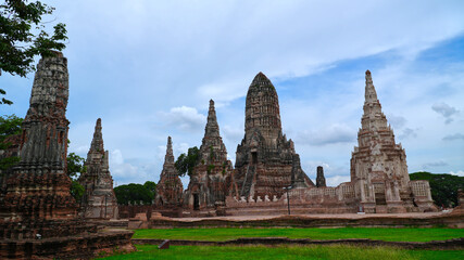 Fototapeta premium Ancient Temple Buildings in Thailand. Landscape views - Wat Chaiwatthanaram Temple Ayutthaya, Thailand : August 19, 2024