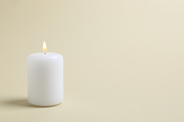 Beautiful aromatic candle on color background 
