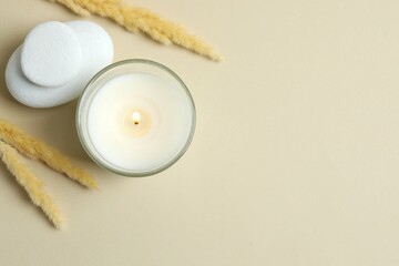Beautiful aromatic candle on color background 