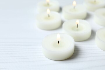 Beautiful candles on white background 
