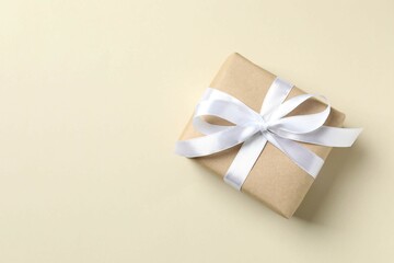 Beautiful gift box on color background