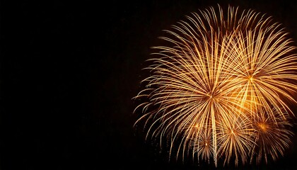 Golden Fireworks on Dark Background: Celebration and Anniversary Display