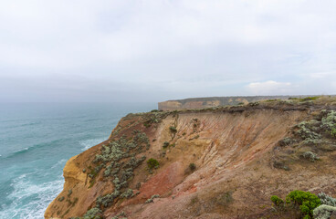 The Bakers Oven so called for the shape of the natural arch in the cliff face. A sea stack on the coast of the Great ocean Road, Australia.