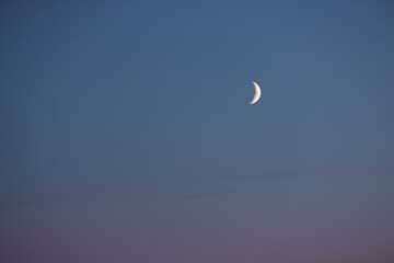 Young moon in the sky