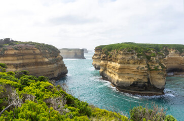 Fototapeta premium Mutton Bird Island Lookout with blue sky at Port Campbell National Park in Victoria, Australia.
