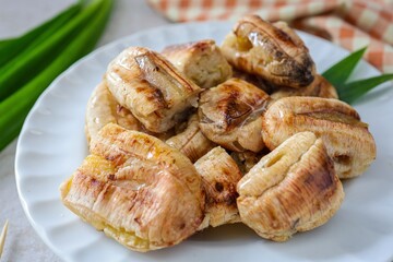 Close up Grilled Banana with Coconut sauce, 