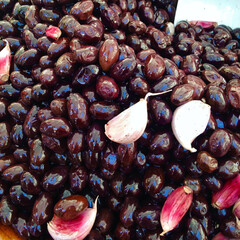 Black olives for sale at a market.