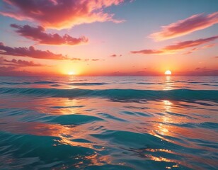 Obraz premium Warm orange and pink tones of sunset reflected in the calm turquoise waters of the sea, pink tones, turquoise waters