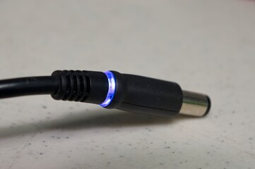 AC Adapter plug with blue LED power indicator ring