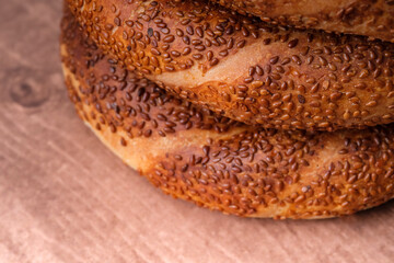 A close-up of a stack of freshly baked Turkish simit. Traditional Turkish bagel of covered in sesame seeds. Ready to be enjoyed.